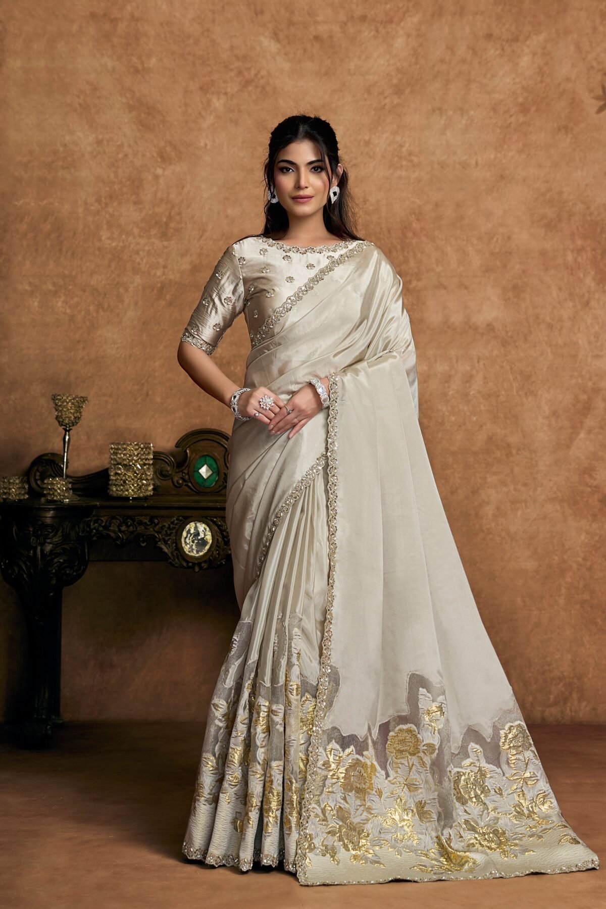 Champagne Ivory Embellished Crepe Silk Saree