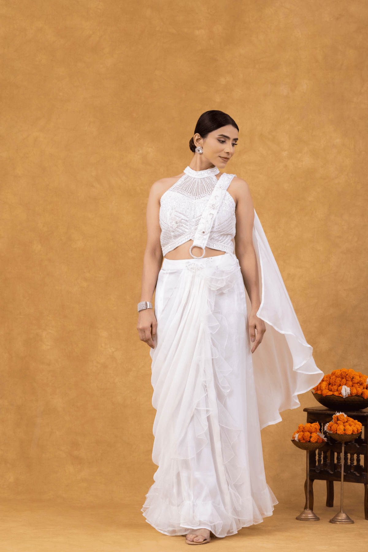 Ivory Ruffle Drape Saree with Embellished Halter Blouse