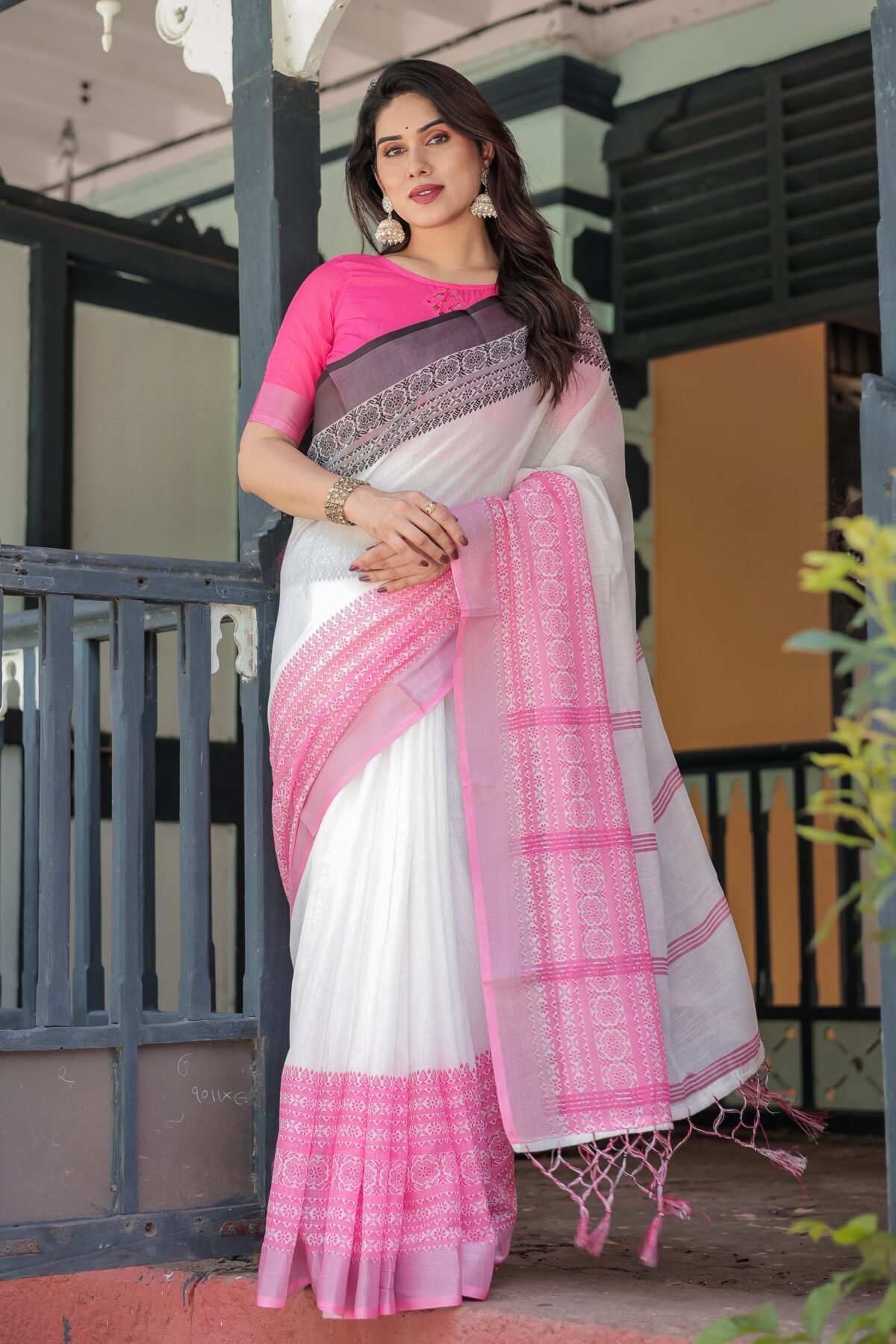 Elegant White and Pink Pure Cotton Linen Saree with Intricate Floral and Geometric Border Design and Tassels on Edges