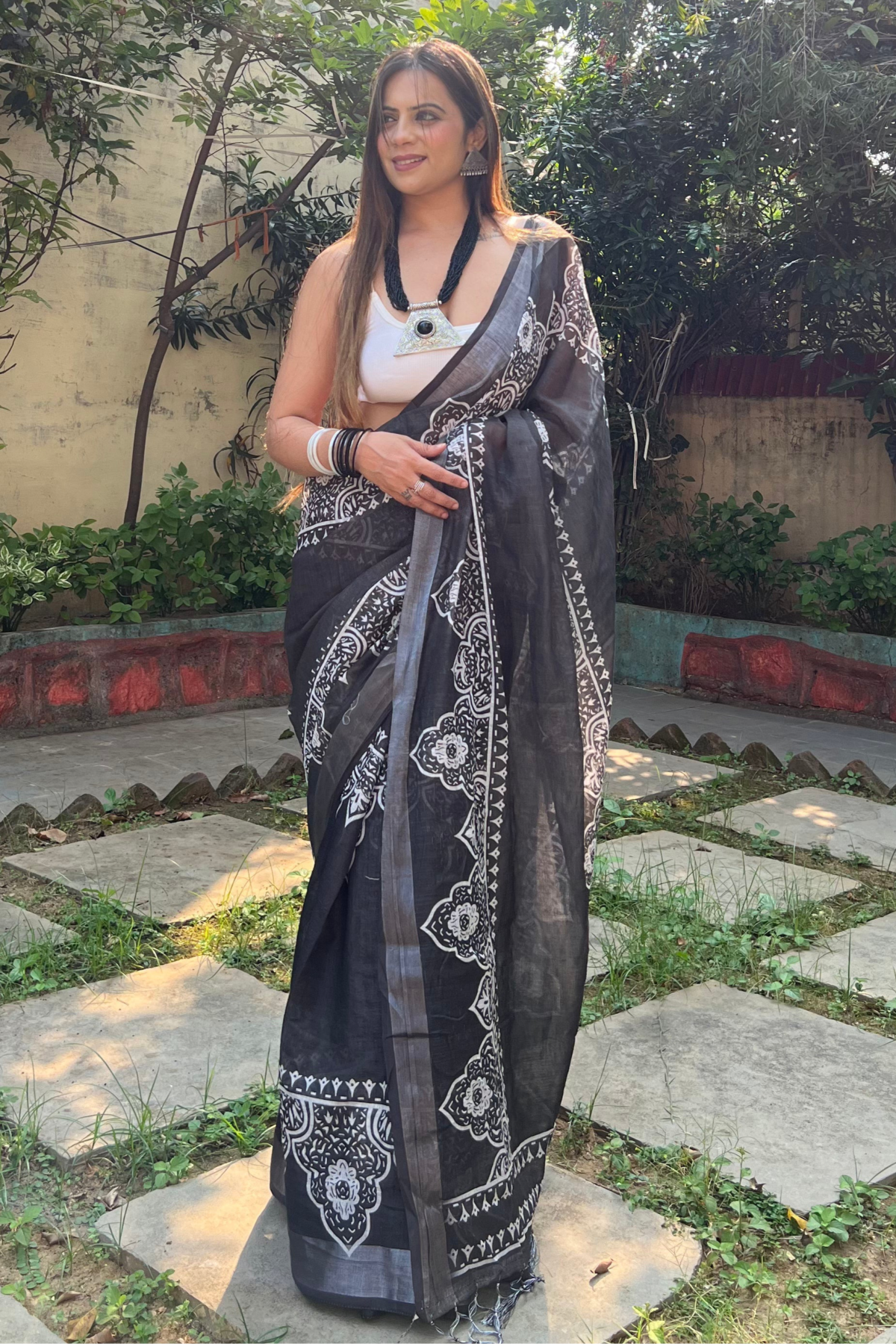 Black and White Pure Cotton Linen Saree with Intricate Floral Design and Tassels on Edges